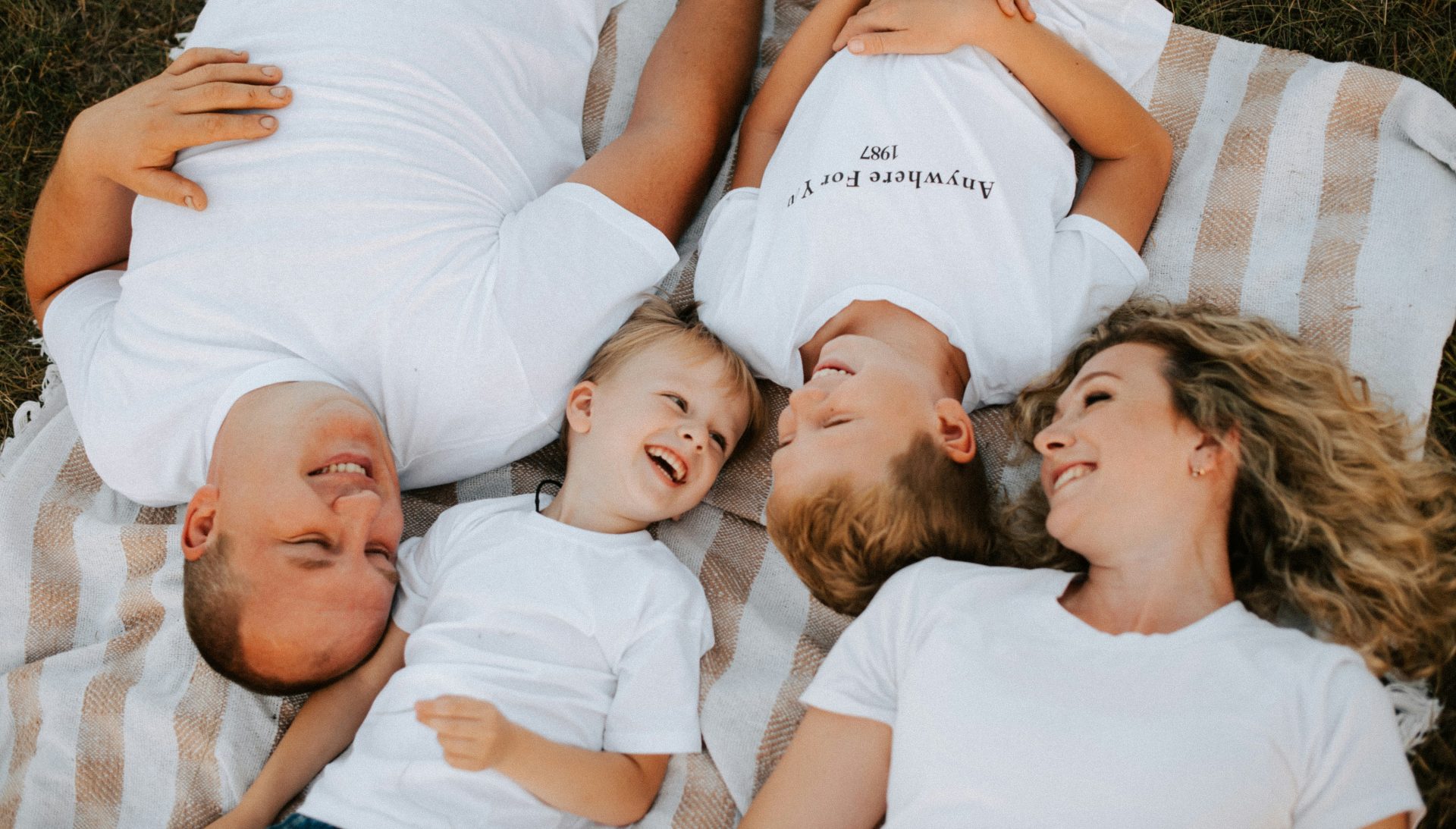 a group of people laying on top of each other